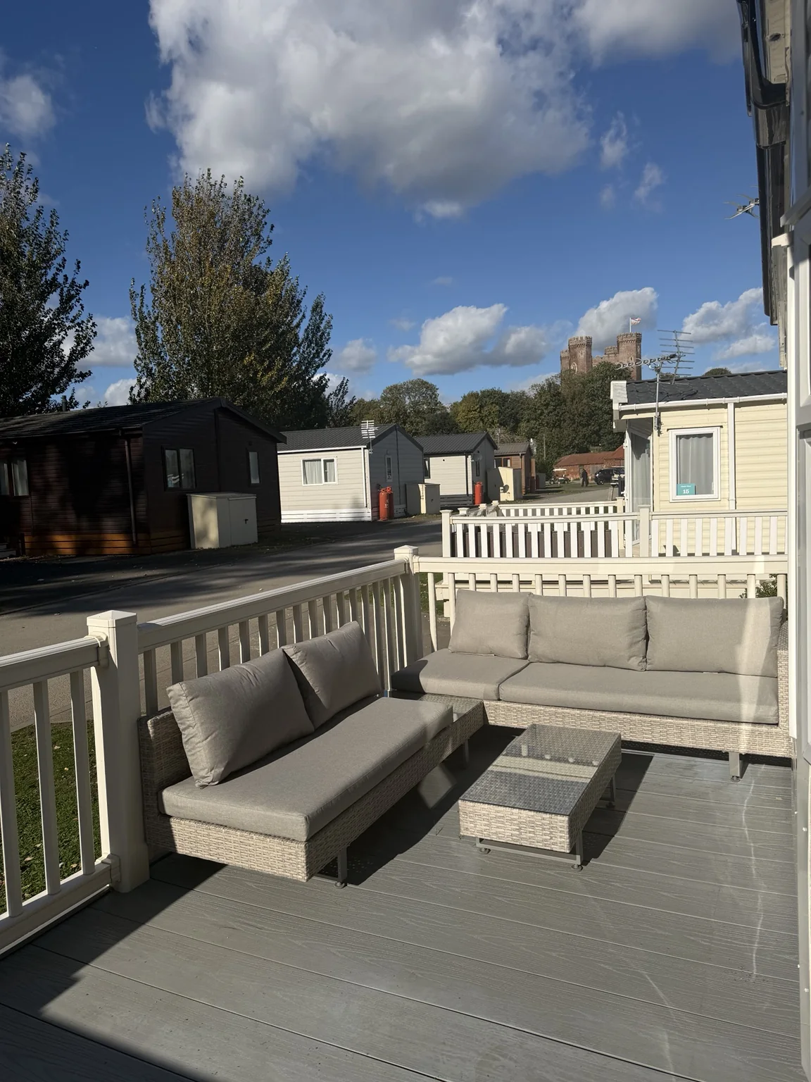 Outdoor seating on the decking with Tattershall Castle in the distance